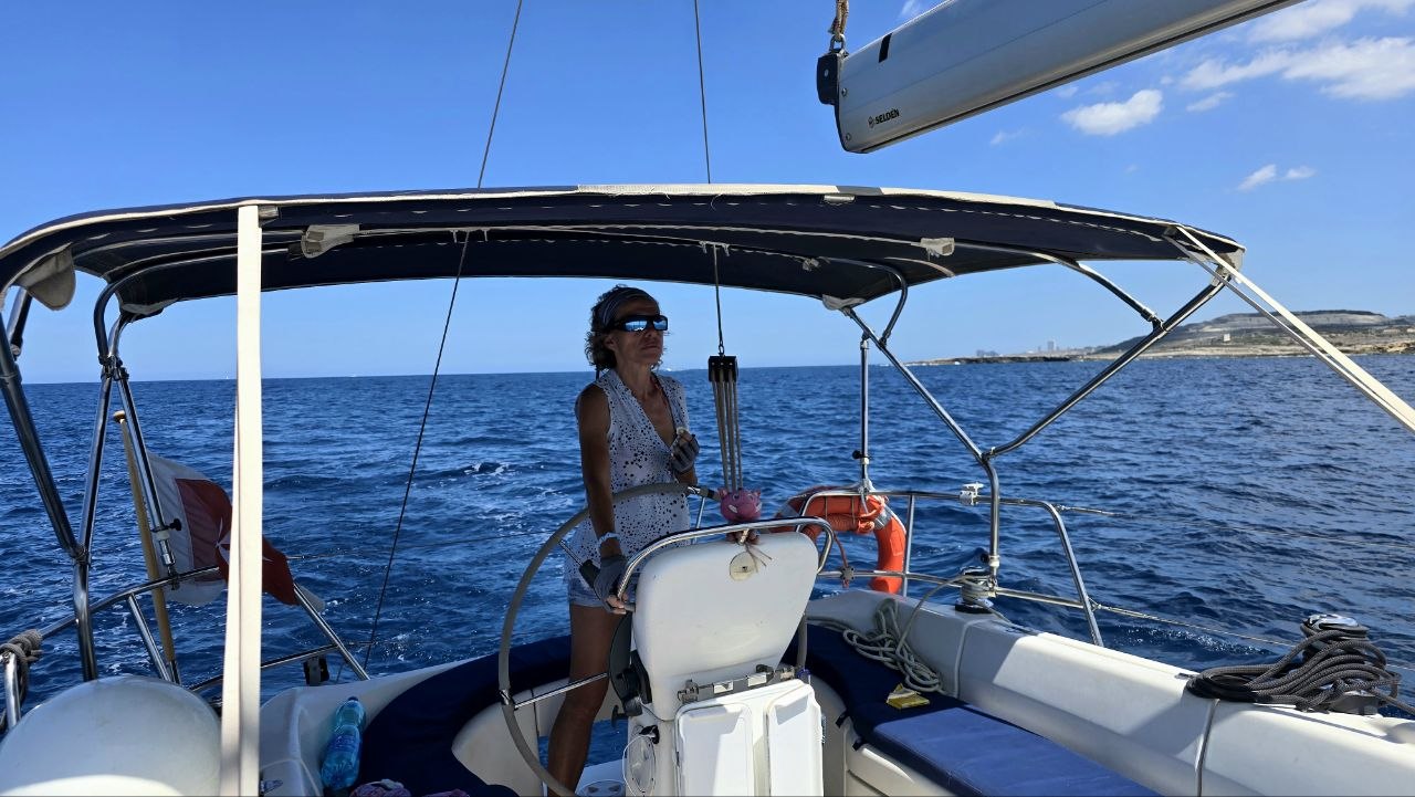 Skipper Cathy at the helm