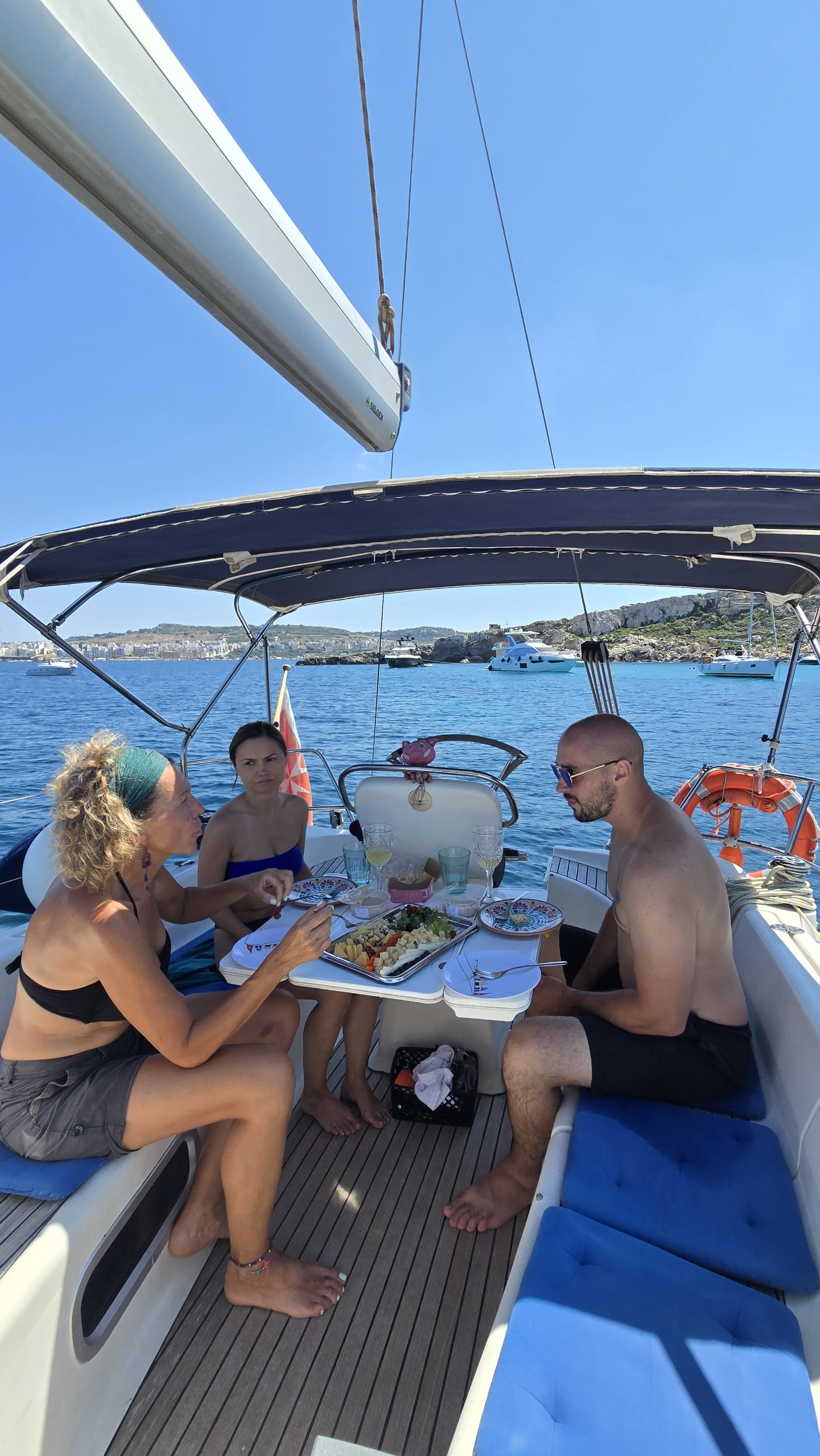Guests dining with a cheese platter at the Blue Lagoon